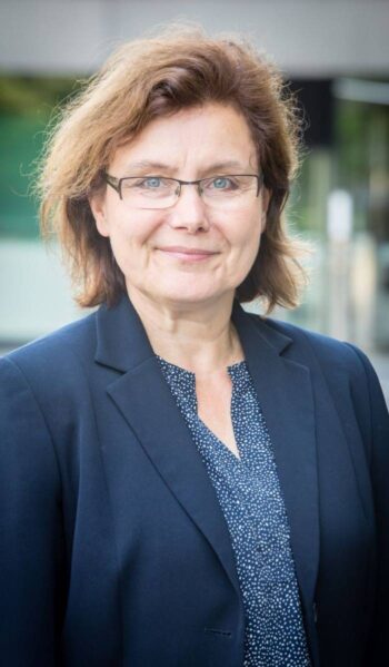 Dr. Heike Winter, Bereichsleitung - Analyse, Policy, Ökosystem Digitaler Euro bei der Bundesbank, thematisiert die strategischen Aspekte des Zahlungsverkehrs. Ihr Fokus liegt auf der Resilienz der europäischen Zahlungsinfrastruktur im Kontext des digitalen Euros.